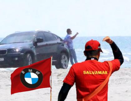 Mamaia: Salvamarii au arborat steagul BMW - "Pericol să te calce mașina pe plajă!"