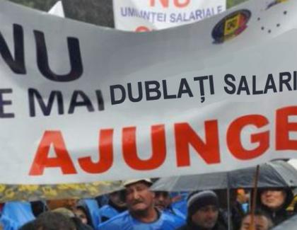 Sindicatele cer guvernului să oprească măririle de salarii: "Rămânem fără niciun ban în portofel!"